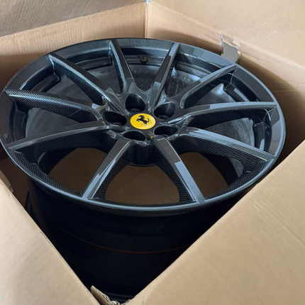 Ferrari 296 carbon fiber wheel in shipping box